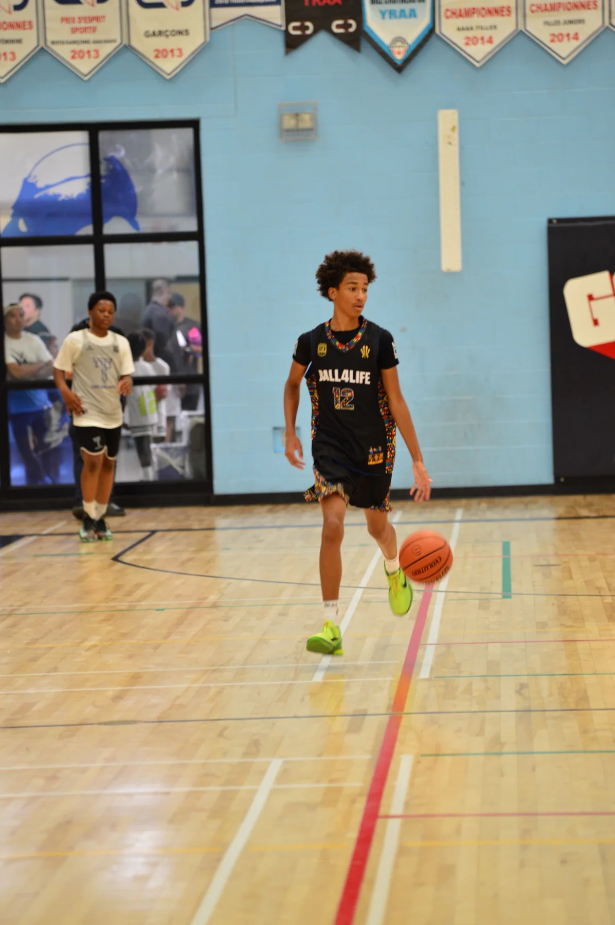 Ball4Life number 12 handling the ball